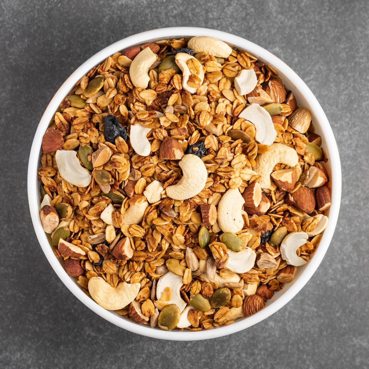 white ceramic bowl with brown nuts